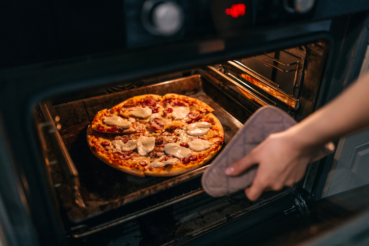 Cooking homemade pizza in the oven.